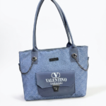 Luxury Blue Lace Shoulder Tote for Women
Designer Style Sky Blue Handbag with Front Pocket
Premium Lace Pattern Tote Bag for Girls & Women Fashionable Blue Carry Tote with Chain Detail
Chic Everyday Women’s Tote Bag  Sky Blue